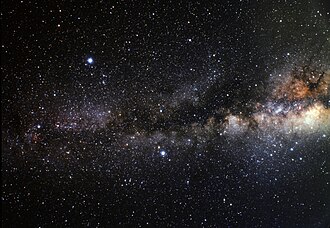 Wide-field view of the Summer Triangle and the Milky Way. Deneb is at the far left centre of the picture, at the end of the darker lane within the Milky Way.