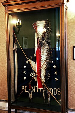 War bonnet and coup sticks used by Plenty Coups during dedication of the Tomb of the Unknown Soldier in 1921, on display at Memorial Amphitheater at Arlington National Cemetery