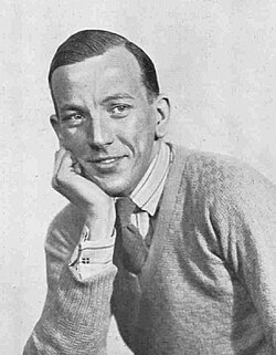 young, clean-shaven white man in neat, informal 1920s clothes