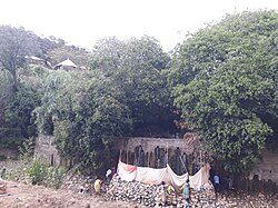 People come to Inda Abba Hadera spring (Inda Sillasie, Ethiopia) to wash in holy water.