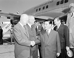 President Dwight D. Eisenhower and Secretary of State John Foster Dulles greet President Ngô Đình Diệm of South Vietnam in Washington, 8 May 1957