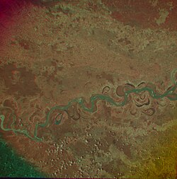 Multispectral image of part of the Mississippi River obtained by combining three images acquired at different nominal wavelengths (800nm/infrared, 645nm/red, and 525nm/green) by Apollo 9 in 1969.