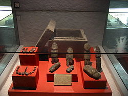 Stone offering box and contents found at the Templo Mayor.
