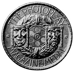 Front of the first Photoplay Magazine Medal of Honor, created in gold by Tiffany & Co. and presented in 1921 to Cosmopolitan Productions for the film Humoresque (1920)