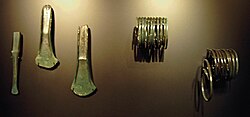 Other associated finds: chisel, axeheads, bracelets