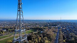 A BBC television and radio transmitting station, Crystal Palace, with Croydon transmitting station in the distance