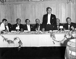 Zukor is honored with a dinner marking his 25 years in the film industry in 1936. From left: Frank Lloyd, Joseph M. Schenck, George Jessel, Zukor, Darryl F. Zanuck, Louis B. Mayer, and Jesse L. Lasky.