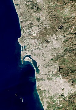 Satellite view of the San Diego–Tijuana area, a transborder agglomeration straddling the Mexico–United States border in the Californias