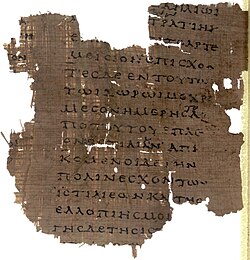 Photo of a damaged text written in black ink