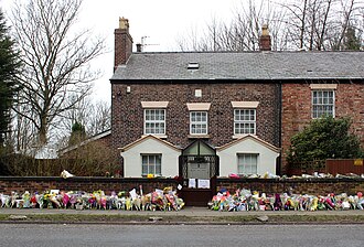 Oak House, Dodd's lifelong home, with floral tributes