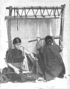 Navajo spinning and weaving on vertical loom