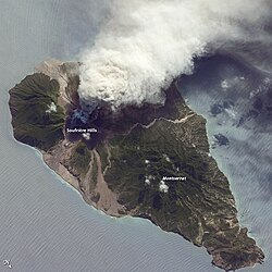 2009 satellite view of the island of Montserrat from the northeast looking southwest, showing an ash and steam plume from the Soufrière Hills volcano