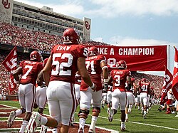 OU takes the field at Oklahoma Memorial Stadium.
