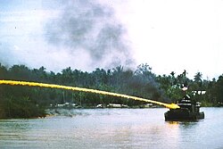 A Mobile Riverine Force monitor using napalm in the Vietnam War[2]
