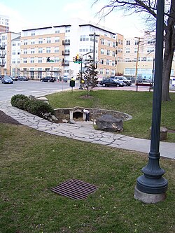 Acorn Park, believed to be the site of the "silver spring", which proved the source of the location's name