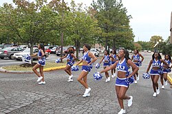 HU's "Blue Thunder" cheerleaders heading towards the annual Military Appreciation Day football game