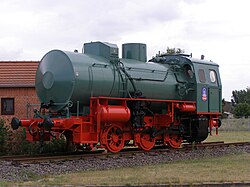 Fireless steam locomotive. Despite the resemblance to a boiler, note the lack of a chimney and also how the cylinders are at the cab end, not the chimney end.