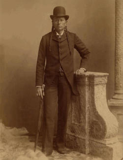 Parker in December 1889 wearing European-American business attire