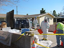 EPA workers clean up residential mercury spill in 2004