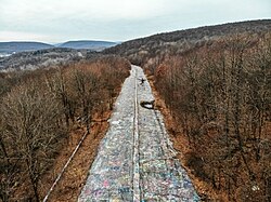 Drone photo of the former "Graffiti Highway" near Centralia in 2019, before it was mostly buried by several hundred access-denial berms