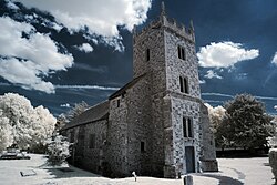 An example of color digital infrared photography. The camera's infrared blocking filter has been removed. Red and blue channels have been swapped for more conventional sky color.
