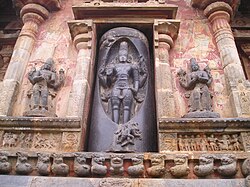 Lingodbhava is a Shaiva sectarian icon where Shiva is depicted rising from the Lingam (an infinite fiery pillar) that narrates how Shiva is the foremost of the Trimurti; Brahma on the left and Vishnu on the right are depicted bowing to Shiva in the centre.