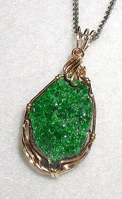 Pendant in uvarovite, a rare bright-green garnet