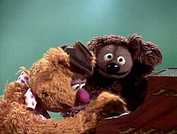 Fozzie Bear (left) and Rowlf the Dog (right) perform "An English Country Garden" in a 1978 episode guest starring Elton John