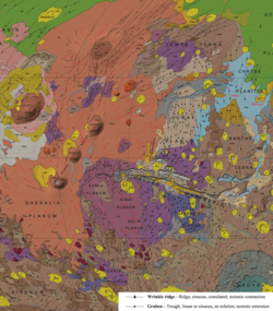 Geological map of the region around the Tharsis plateau. Extensional and compressional features – e.g., graben and wrinkle ridges – have been mapped and are visible in the image. (USGS, 2014).[1]