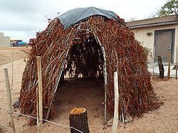 A replica of a historical Yavapai brush shelter