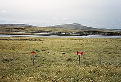 Minefield laid by Argentinian forces in Port William, Falkland Islands in 1982. Demining was inhibited by the boggy terrain