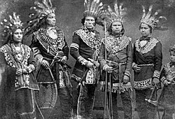 Maungwudaus, his wife, and three of his troupe of Ojibwa performers.