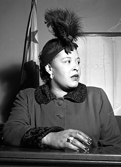 Holiday in court over a contract dispute, late 1949