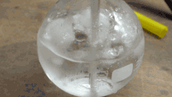 Water boiling at 0°C using a vacuum pump.