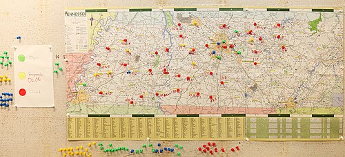 FEMA Logistics specialists use a map of Tennessee and coloured pins to create a visual reference of the location and status of Disaster Recovery Centers