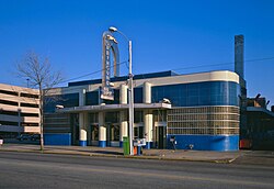 A Greyhound station located in Richmond, Virginia and constructed 1938-1939. Curved glass blocks are prominent along the front exterior of the building, demonstrating the Streamline Moderne architectural style endemic to the period.