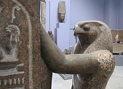 Detail of Horus's face, from a statue of Horus and Set placing the crown of Upper Egypt on the head of Ramesses III. Twentieth Dynasty, early 12th century BC.