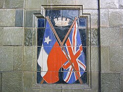 British and Chilean flags in a monument in Antofagasta city
