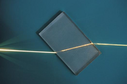A ray of light being refracted in a plastic block