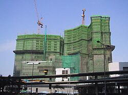 Bamboo scaffolding can reach great heights.