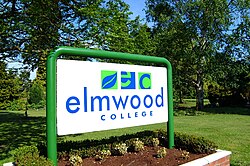 Former logo of Elmwood College