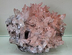 Calcite is a carbonate mineral (CaCO3) with a rhombohedral crystal structure.