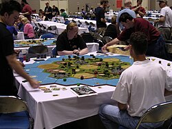 A game of The Settlers of Catan being played at Gen Con Indy 2003