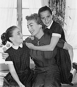 Crawford with twins Cathy and Cynthia