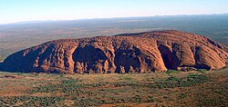 Uluru (Ayers Rock) in Australia is underlain by the Mutitjulu Arkose, a formation composed almost entirely of a single lithology (arkosic sandstone).