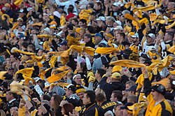 Pittsburgh Steelers fans waving the Terrible Towel, a tradition that dates back to 1975