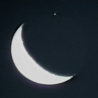 In this July 1997 still frame captured from video, the bright star Aldebaran has just reappeared on the dark limb of the waning crescent moon in this predawn occultation.