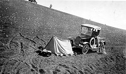 "Picturesque camp made by a lone geologist on the cinders of Inferno". This photo was taken during a U.S. Department of the Interior Geological Survey in 1921.