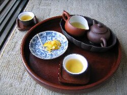 A traditional Chinese tea culture (茶艺，茶藝) set and three gaiwan.