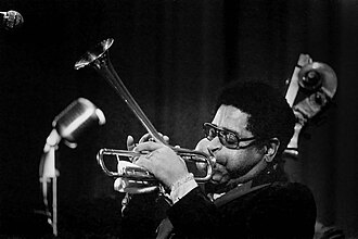 Gillespie performing for The Giants of Jazz in 1971, an exemplar shown also of his cheek-oriented laryngoceles
